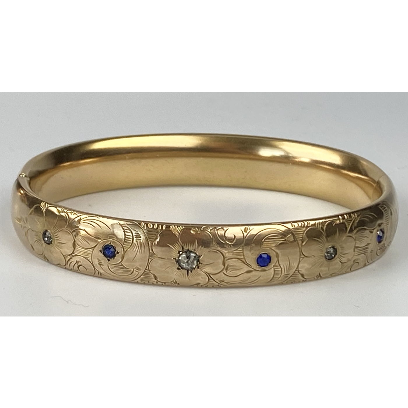 Unusual Blue and Clear Stones and Floral Engraving Engagement Bangle