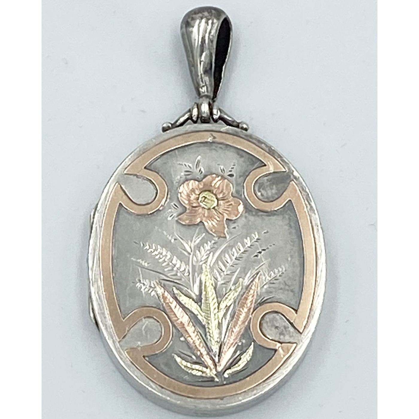 Fabulous Central Flower in Applied Yellow and Rose Gold Antique Silver English Locket