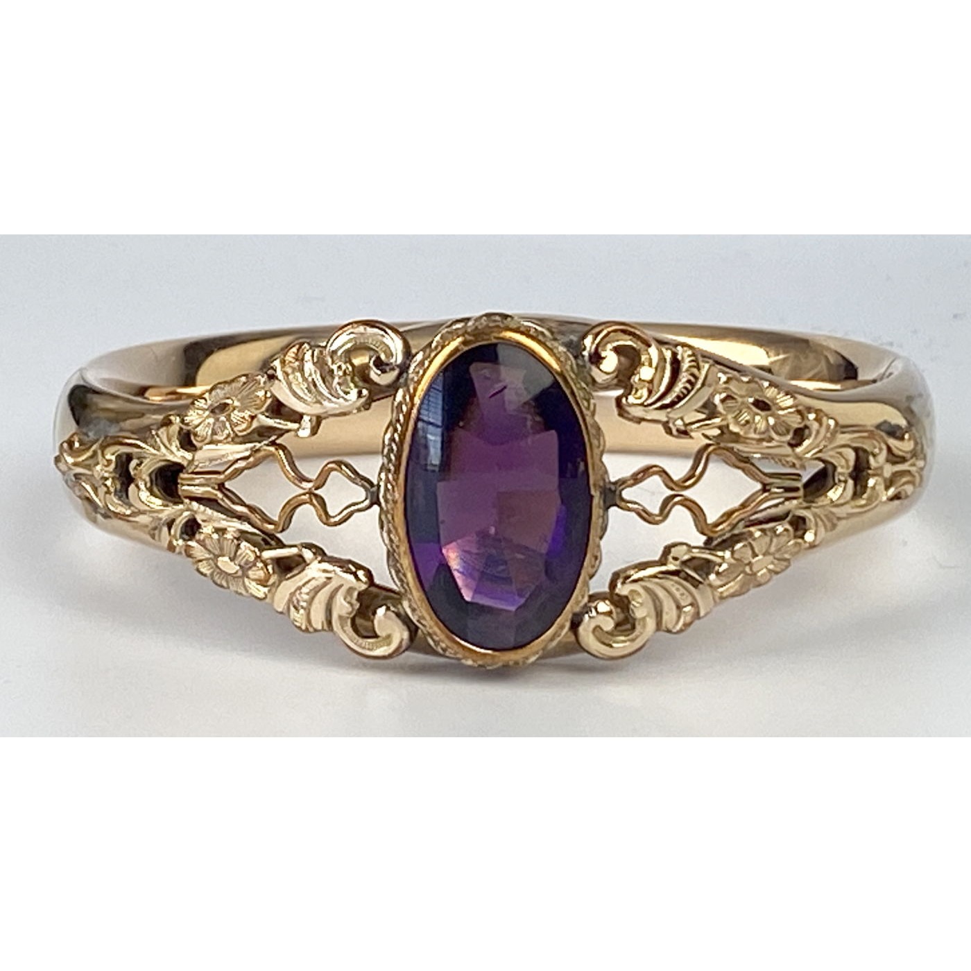 Deep Purple Oval Center Stone Lots of Repousse Engagement Bangle