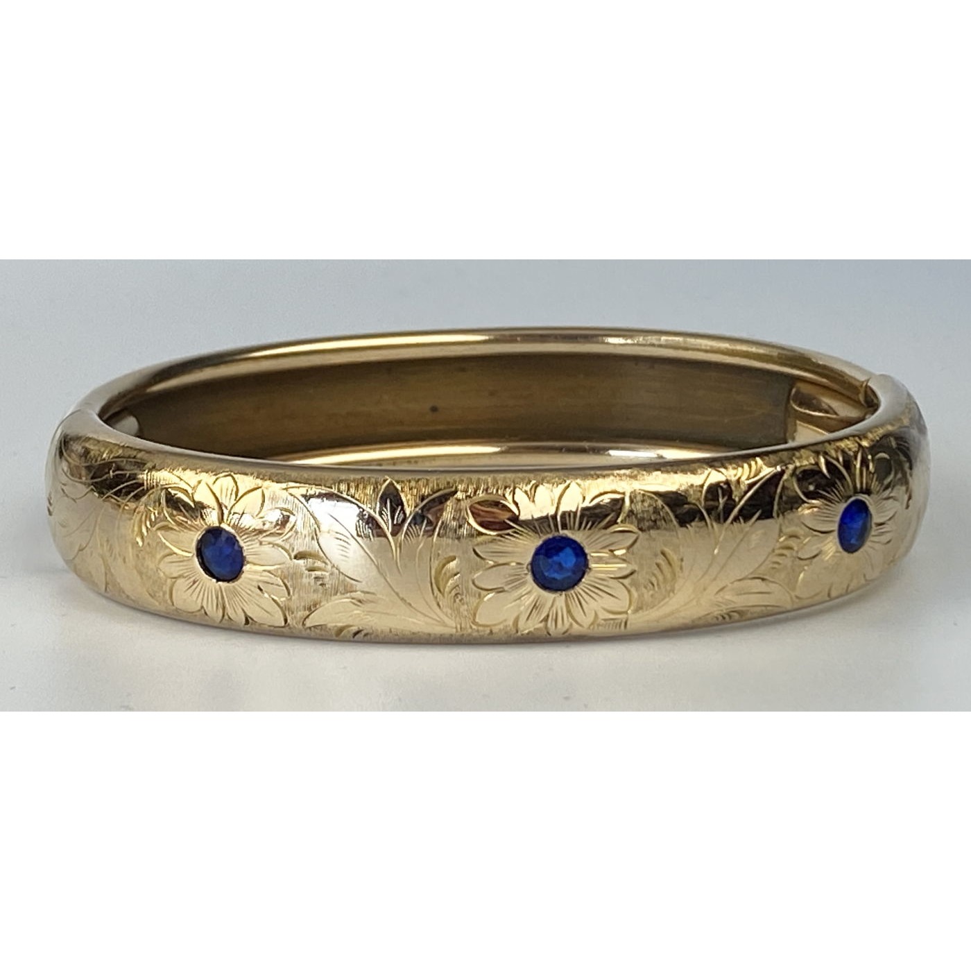 Brilliant Blue Stones and Floral Engraved Engagement Bangle