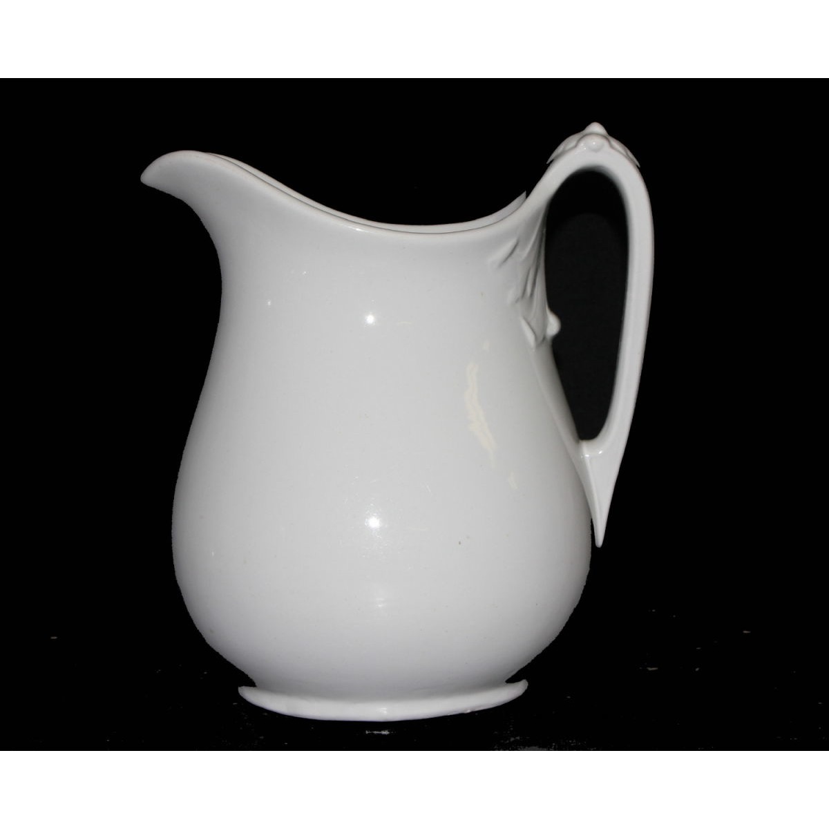 Plain Ironstone Milk Pitcher with Exaggerated Scroll under Handle